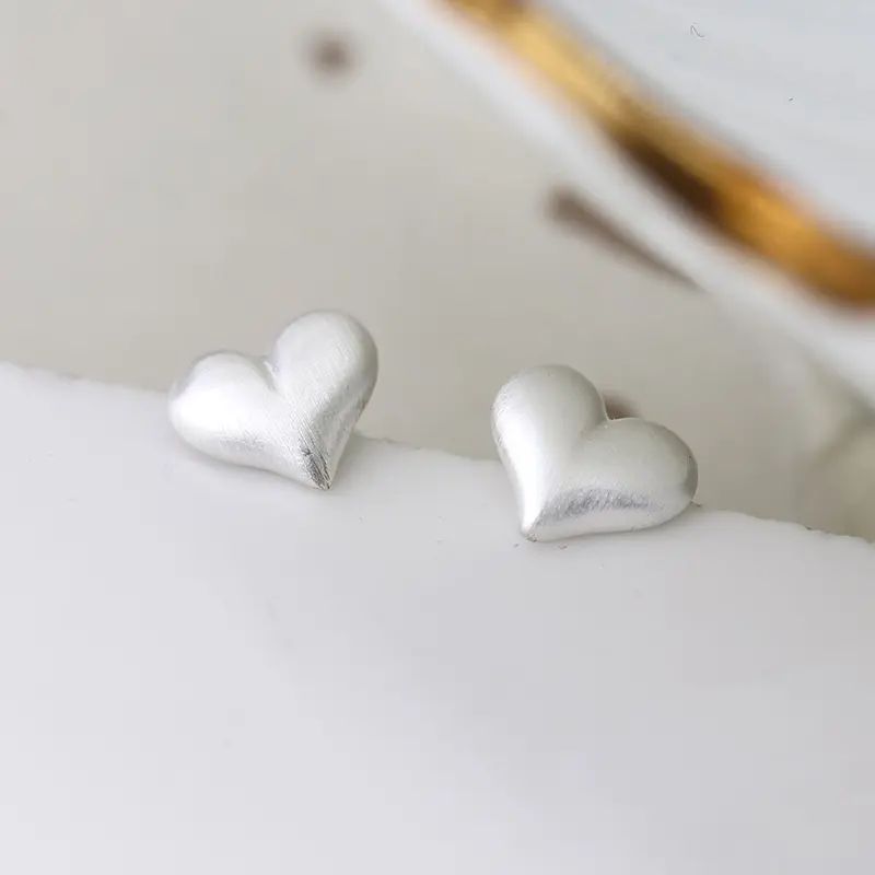 Brushed heart stud earrings
