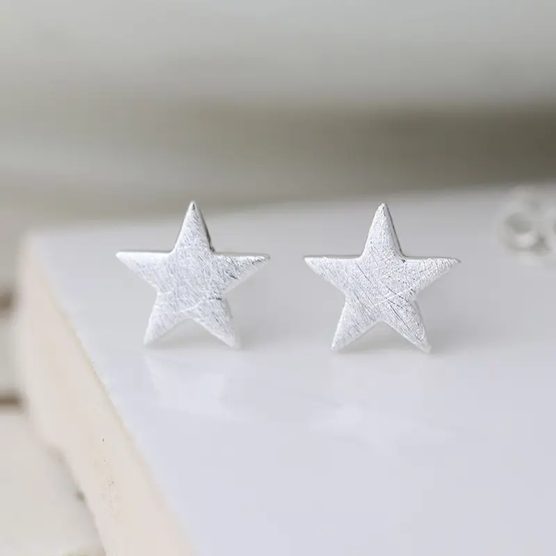 Brushed star stud earrings