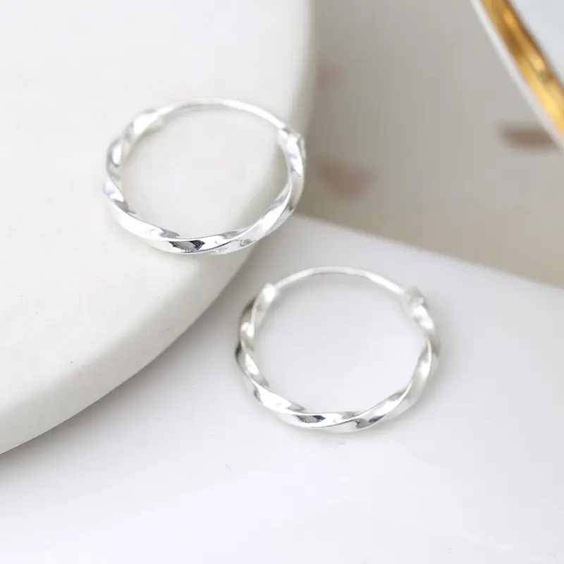 Silver smooth twisted hoop earrings