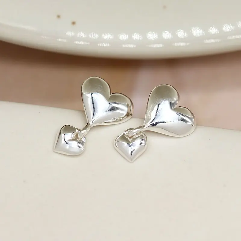 Sterling silver double drop heart stud earrings