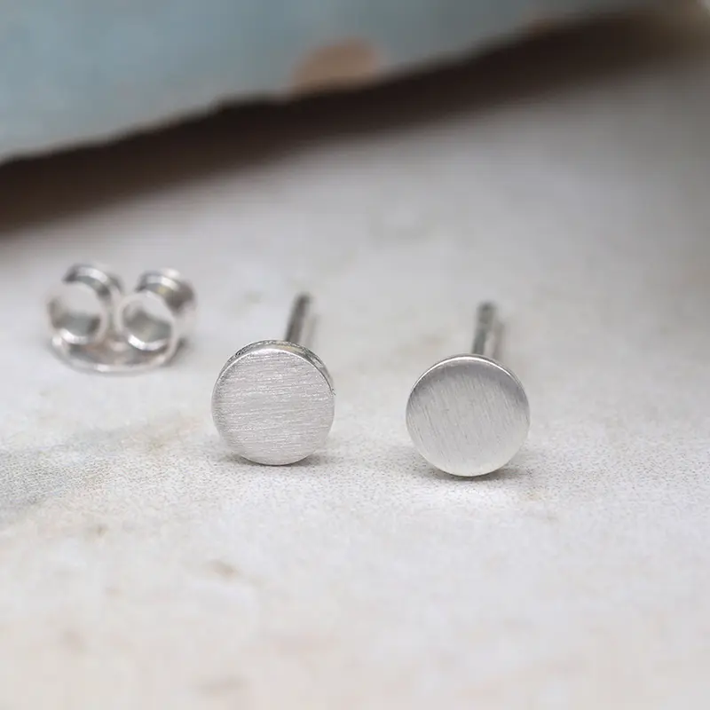 Tiny matt round silver studs